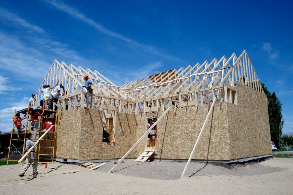 Trusses going up on the first Habitat for Humanity house in Green River